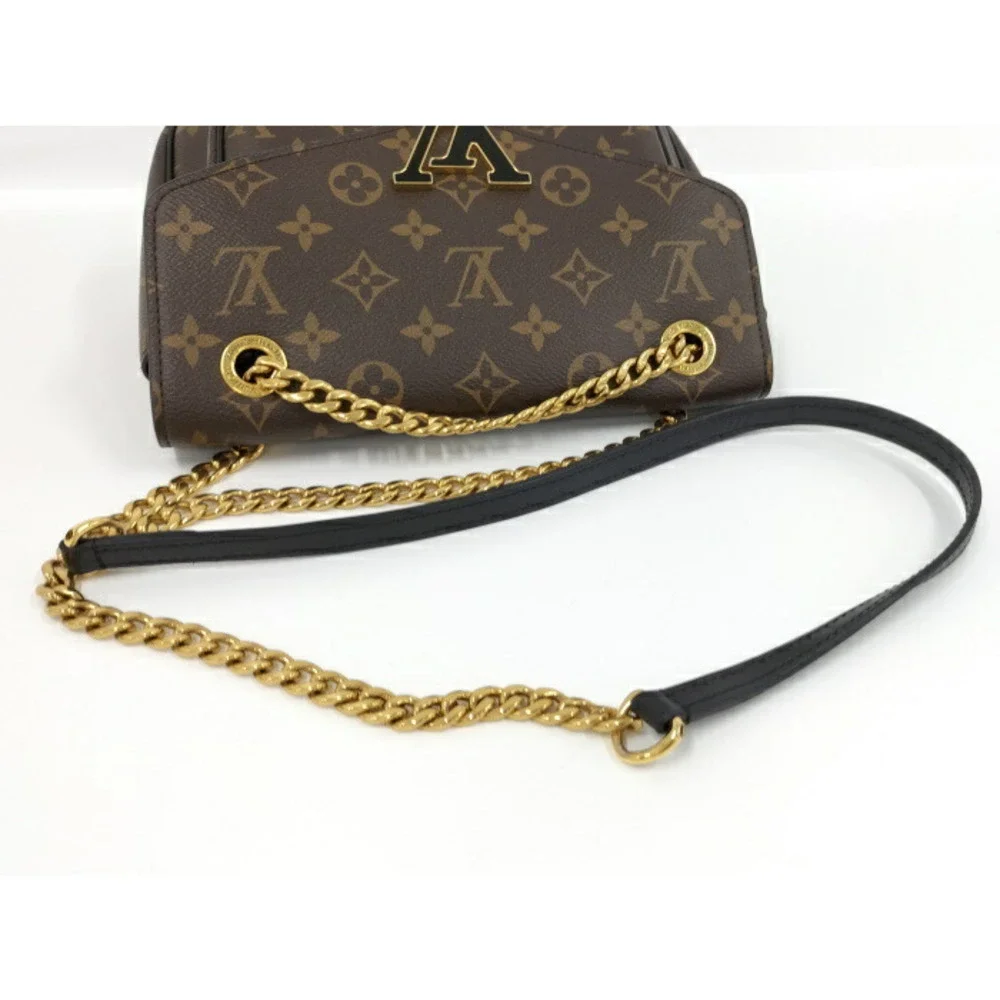 Louis Vuitton Monogram Canvas Shoulder Bag with Gold Hardware and Black Strap